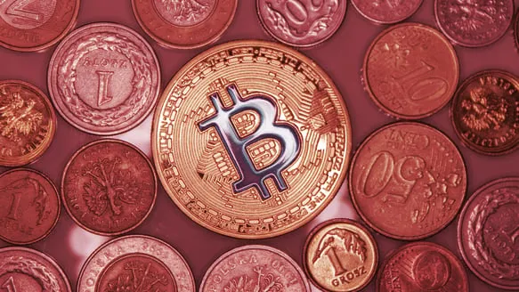 Bitcoin surrounded by some other coins. Image: Shutterstock.