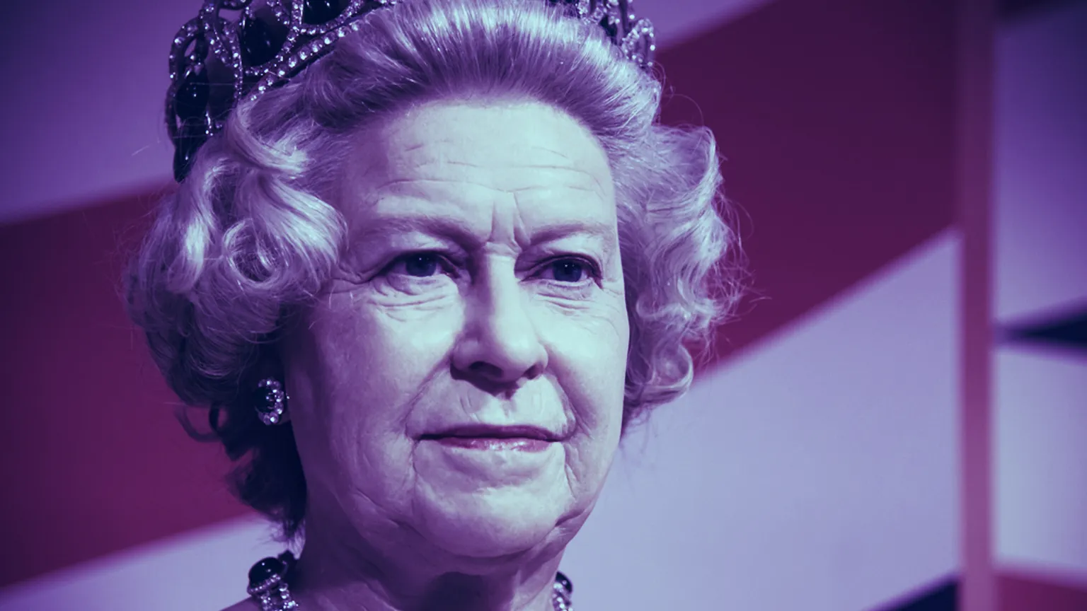 Queen Elizabeth II puts on a brave face as bitcoin's price plummets. PHOTO CREDIT: Shutterstock