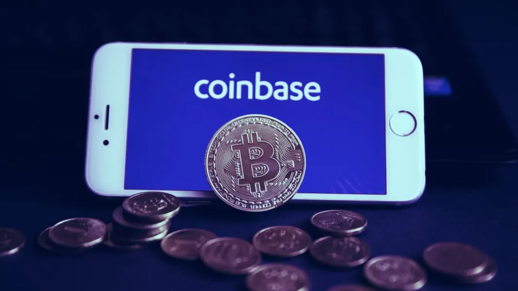Some Bitcoin in front of the Coinbase logo. Image: Shutterstock.