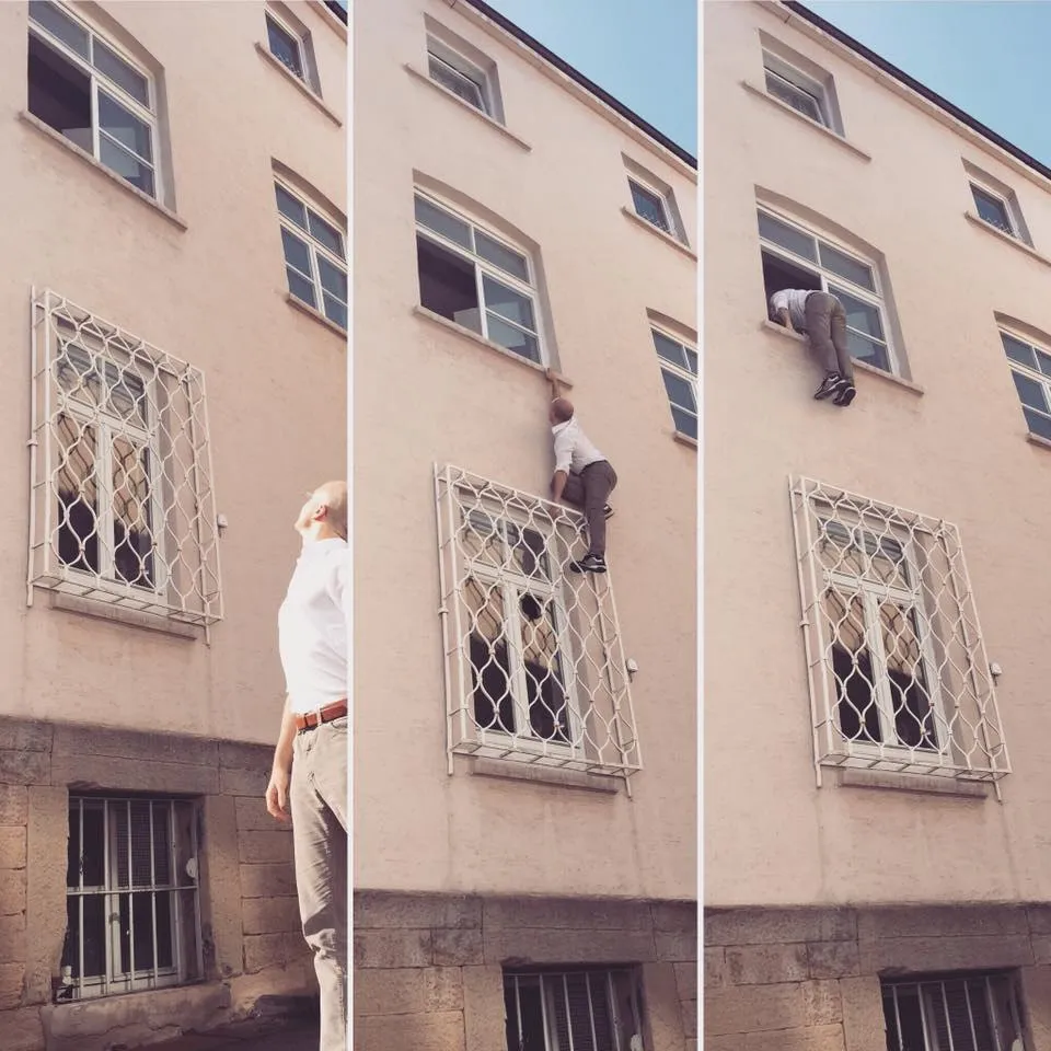 Extreme sports runner climbs building