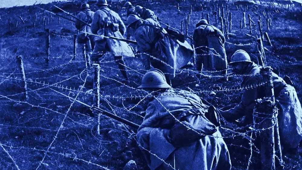World War 1: Battle of Verdun. French soldiers crawling through their own barbed wire entanglements as they begin an attack on enemy trenches. April-June, 1916.; Shutterstock ID 785840254; Client/Licensee: decryptmedia