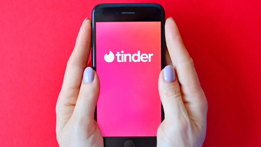Thousands of images were stolen from Tinder by catfishers. Image: Shutterstock.