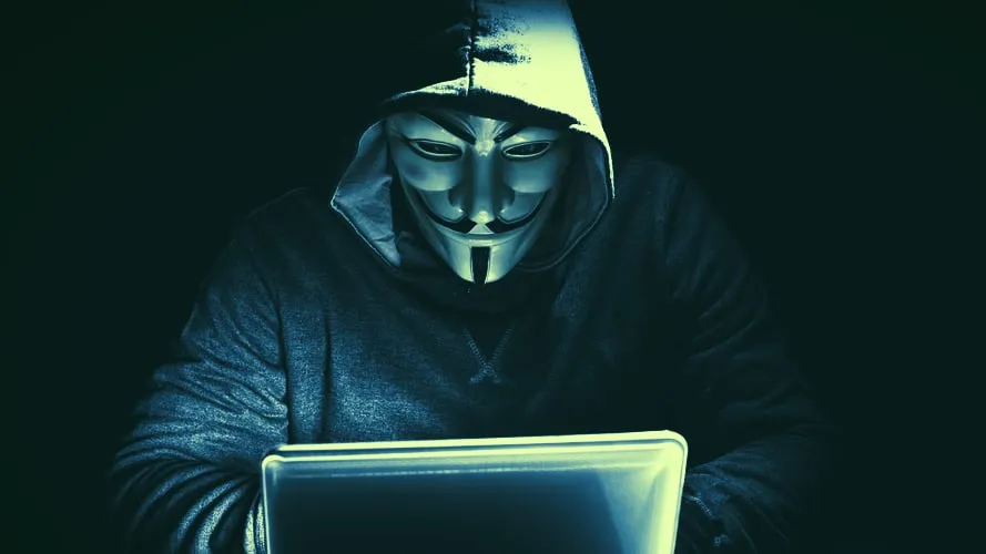 A supposed hacker, at a keyboard. Image: Shutterstock.
