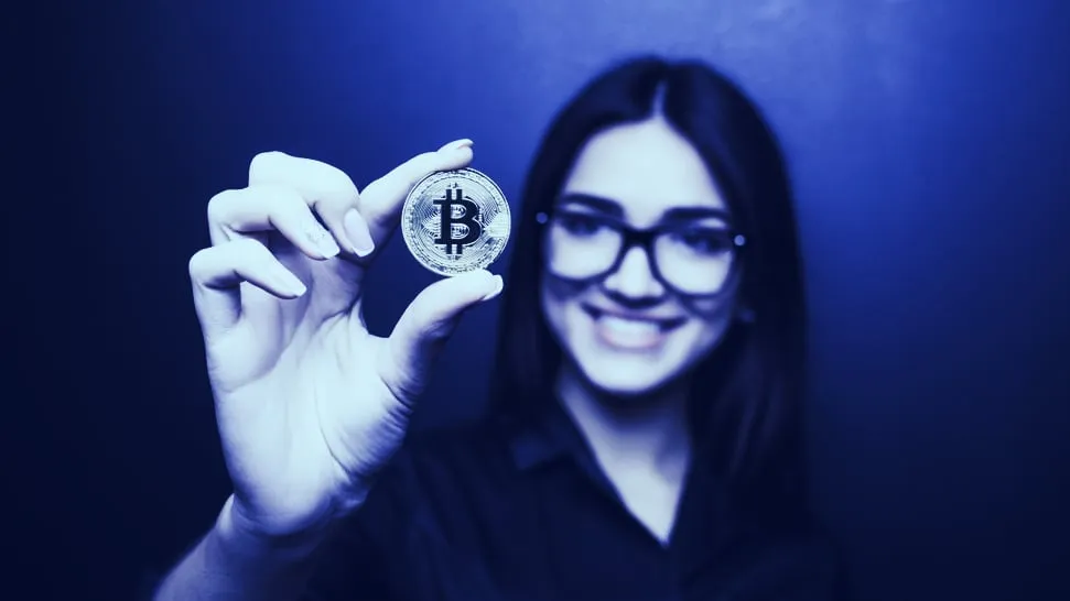 Holding up a Bitcoin. Image: Shutterstock.