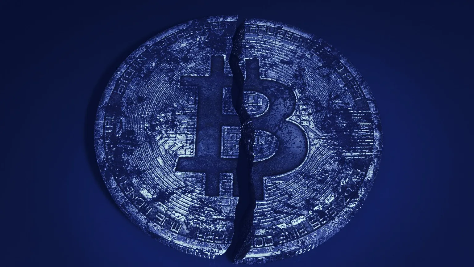 A Bitcoin split in two. Image: Shutterstock