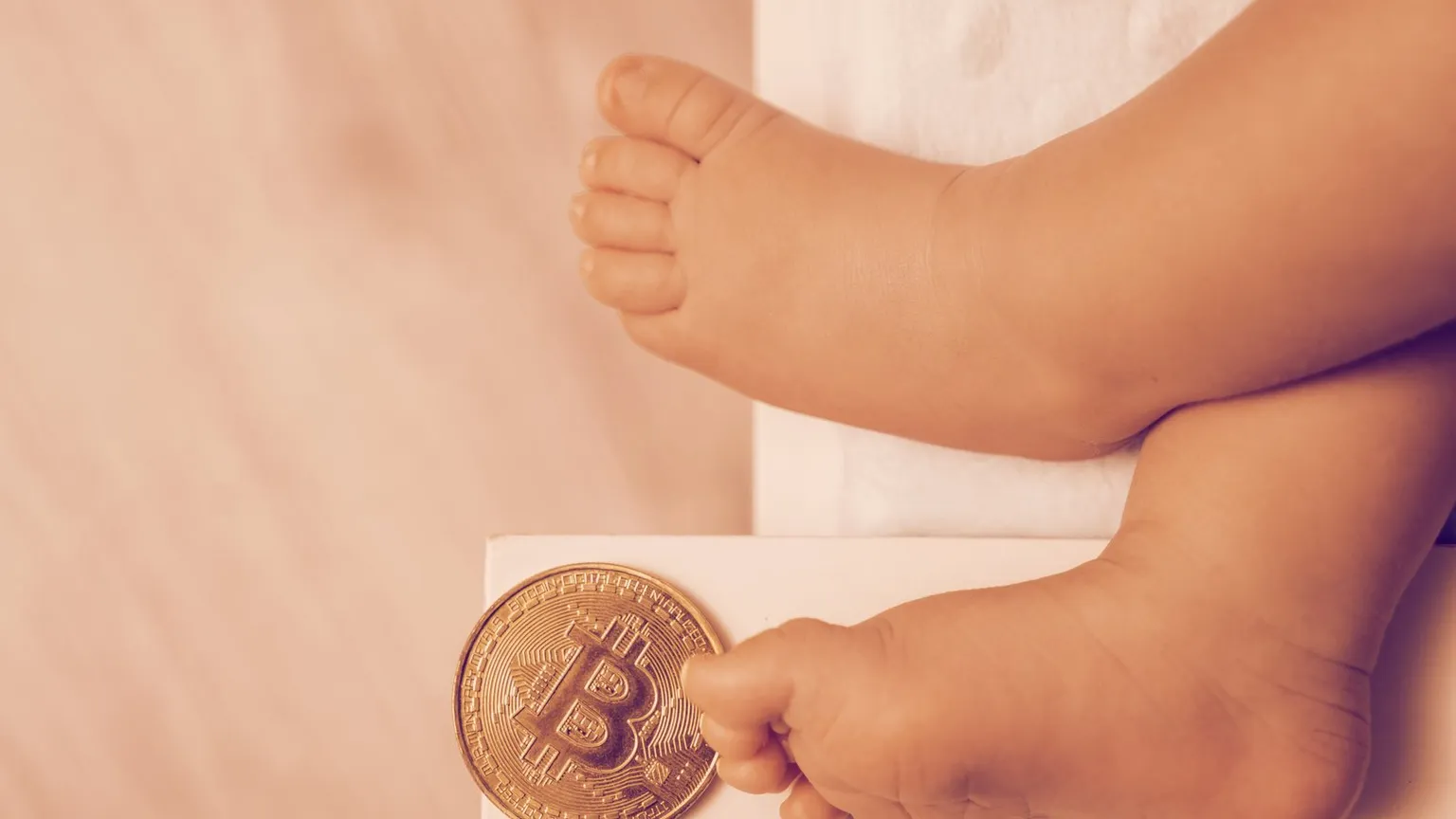 A man has welcomed his firstborn into the world with a message on the Bitcoin blockchain. (Image: Shutterstock)