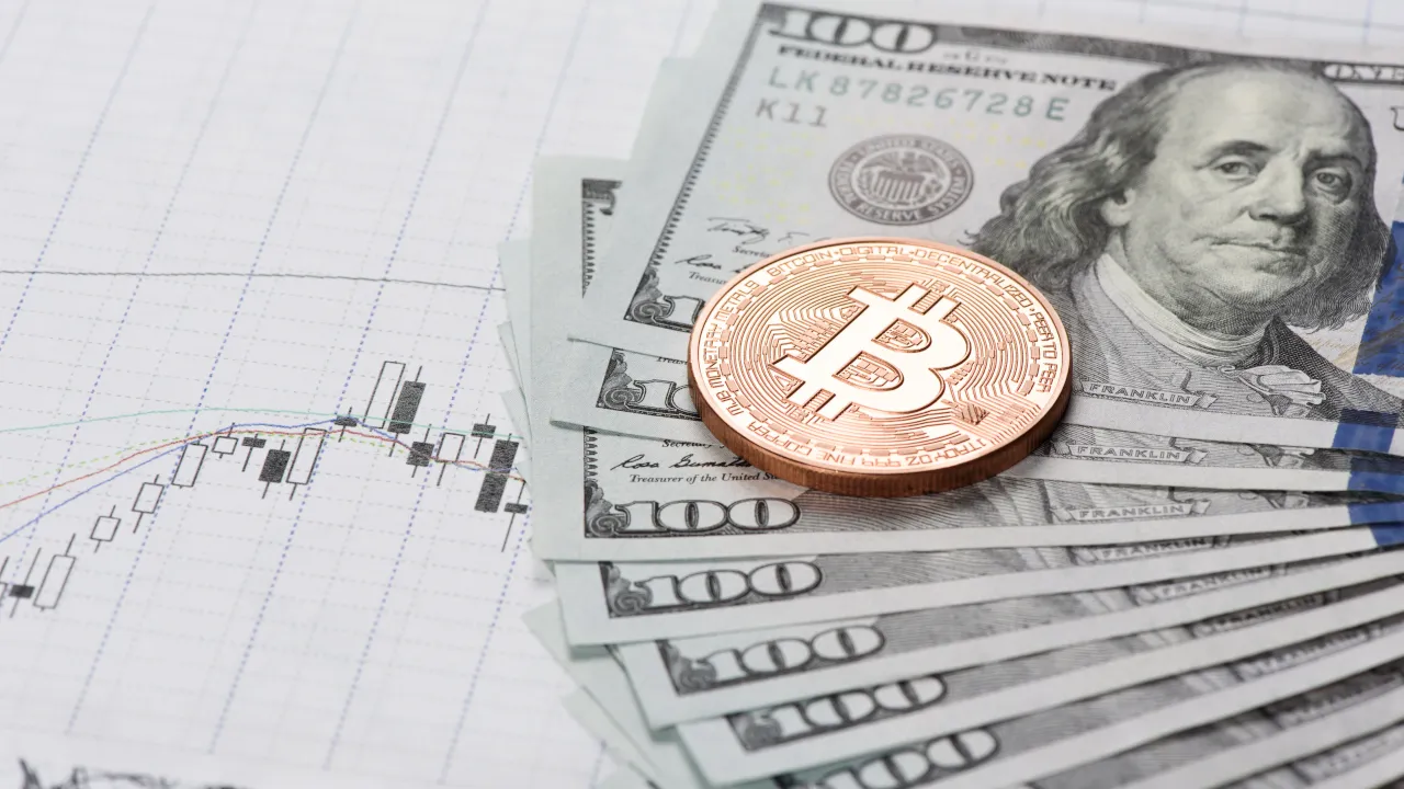 Bitcoin next to US dollars