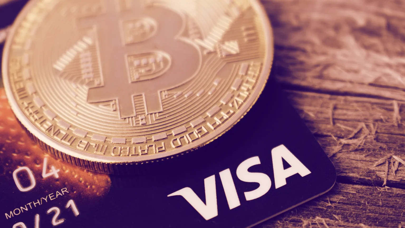 Visa y Bitcoin. Imagen: Shutterstock