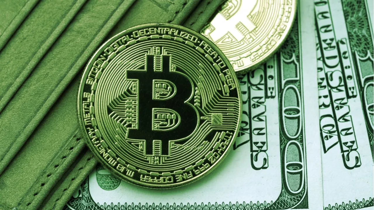Una Cartera con Bitcoin. Image: Shutterstock