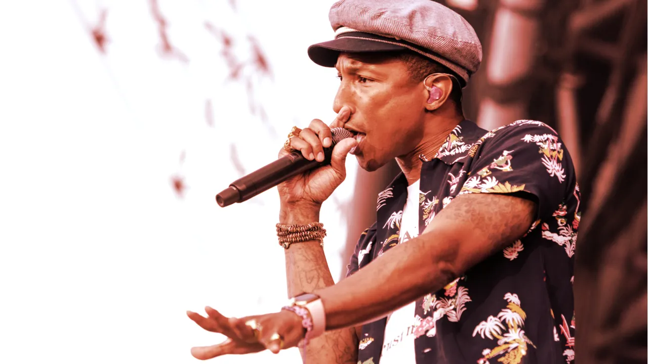 Pharrell Williams in concert. Image: Shutterstock