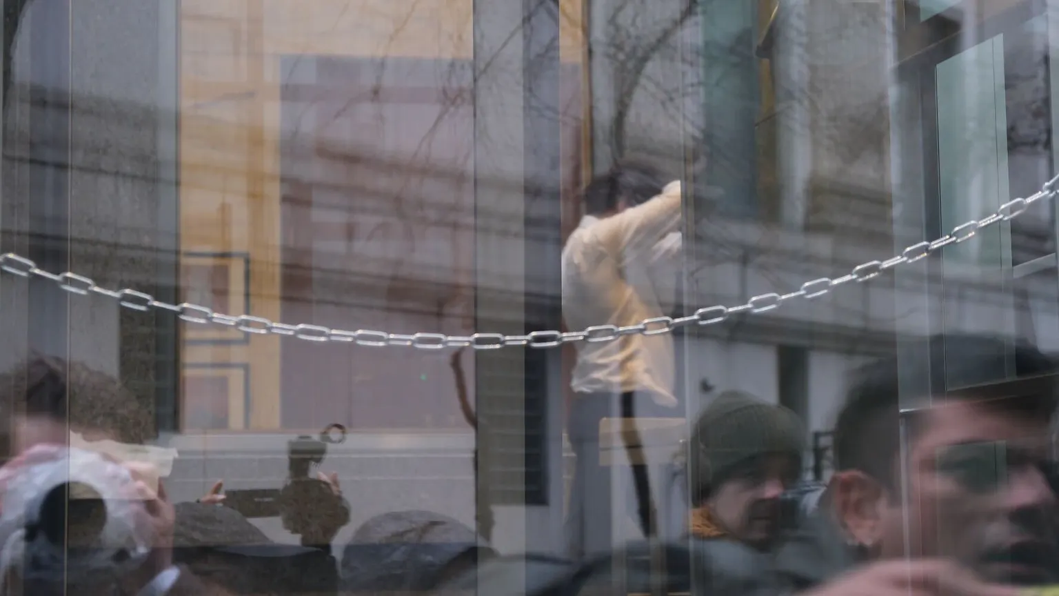 Sam Bankman-Fried going through courthouse security just before entering a plea of not guilty on January 3