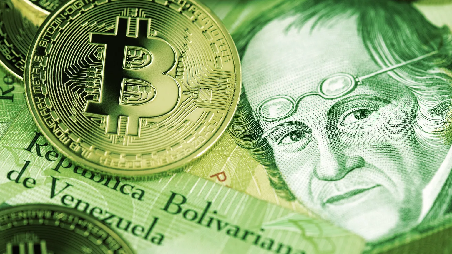 Bitcoin on Venezuela money Bolivar banknotes. Image: Shutterstock