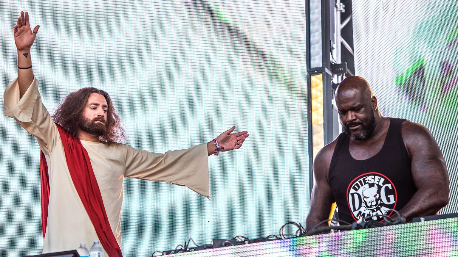 Shaq aka Diesel performs with a Jesus impersonator at Lollapalooza in Grant Park, Chicago in 2019. Image: Ted Alexander Somerville/Shutterstock