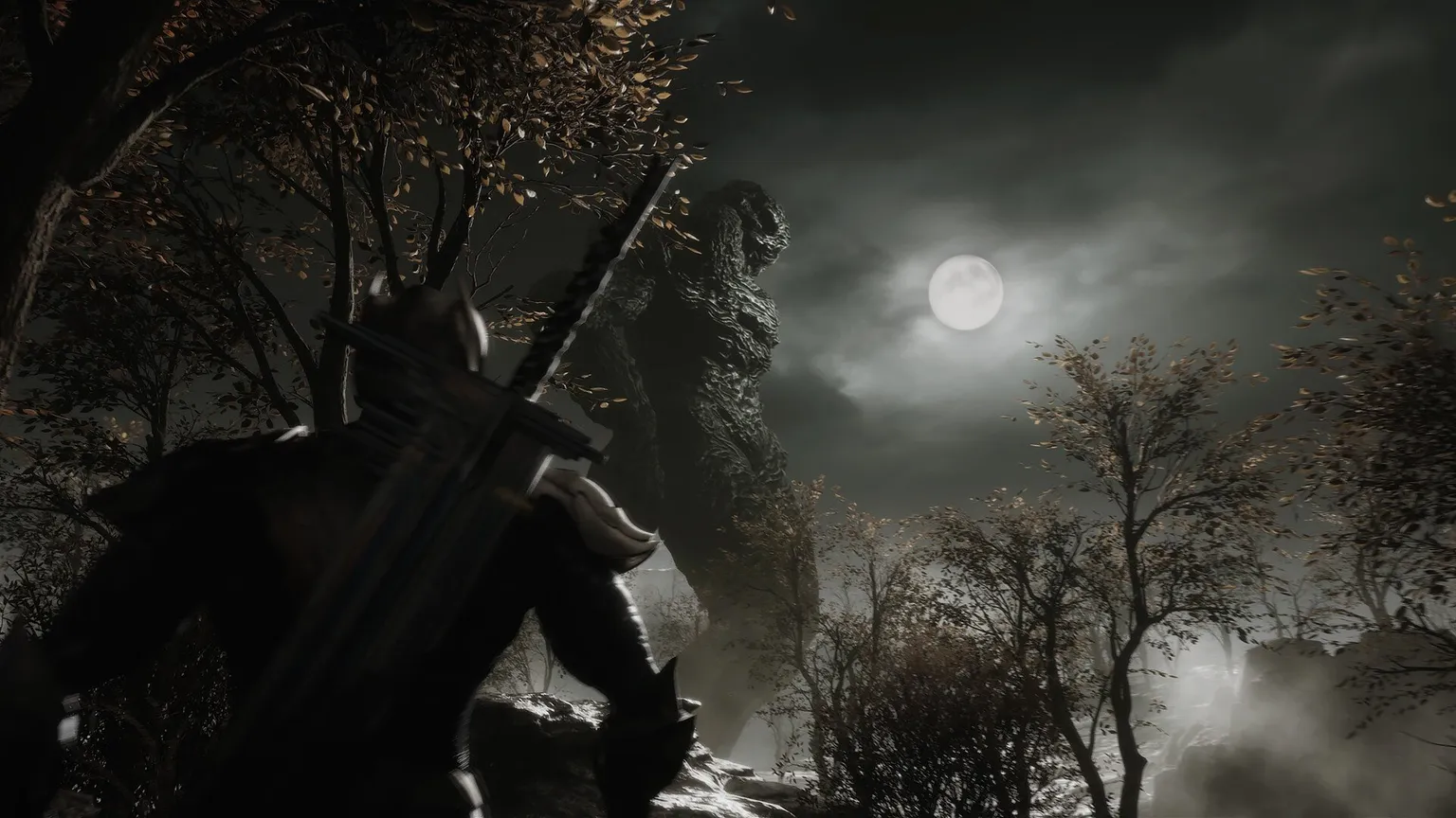 Screenshot showing character with sword looking up at dark cloudy sky with full moon and massive, stone-like godzilla type of creature above him.