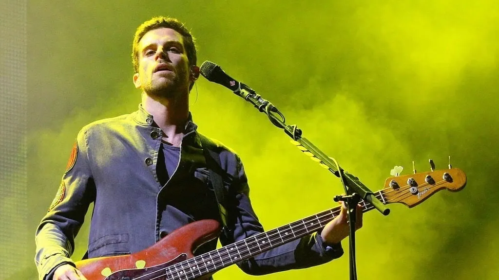 Guy Berryman, performing with Coldplay in Japan, in 2011. Image: Wikimedia.
