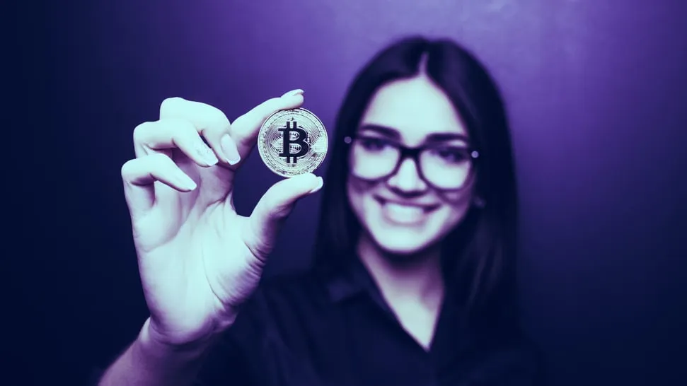 Holding up a Bitcoin. Image: Shutterstock.