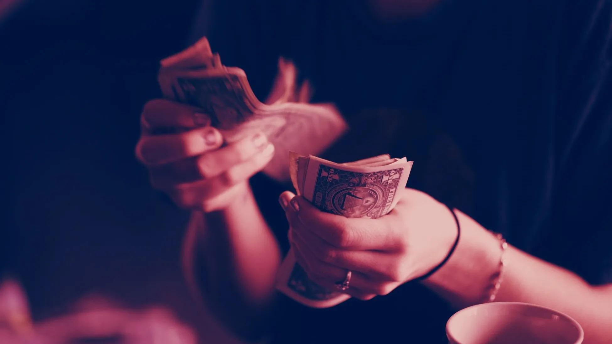 Counting the cash. Image: UNSPLASH