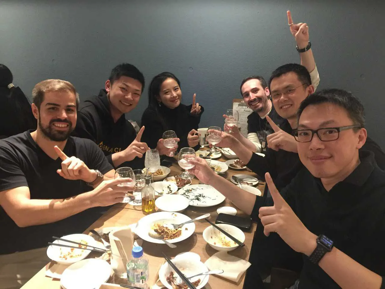 Binance staff celebrate becoming the biggest crypto exchange