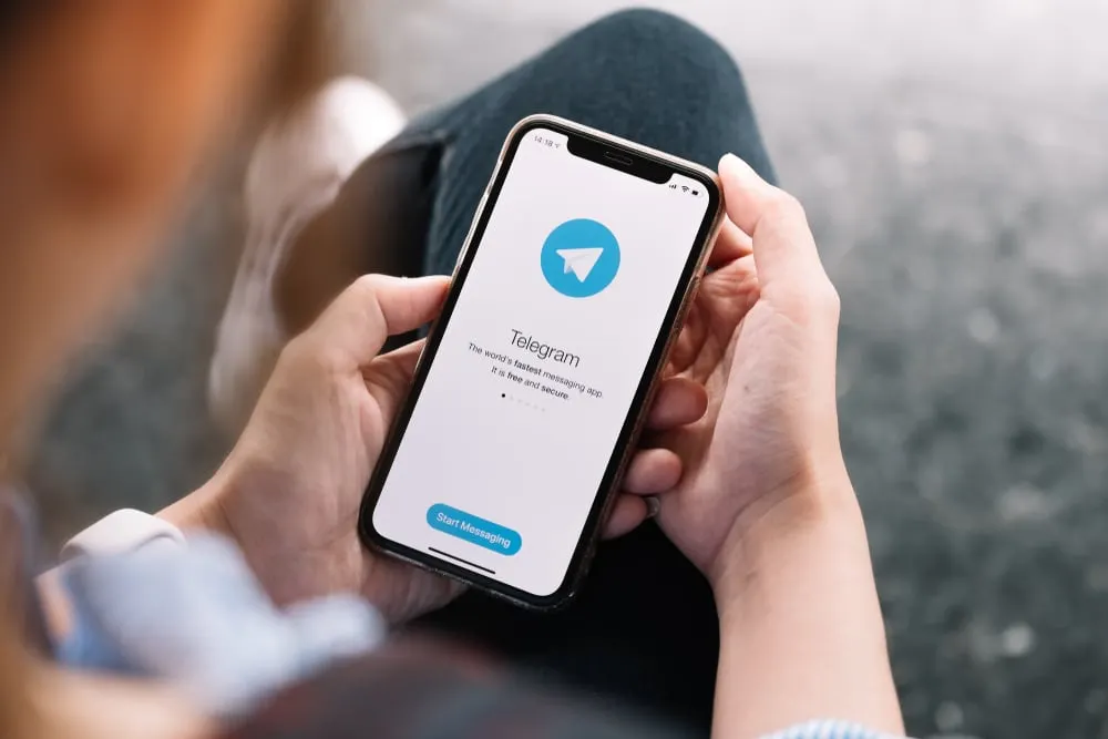 Person using the Telegram app