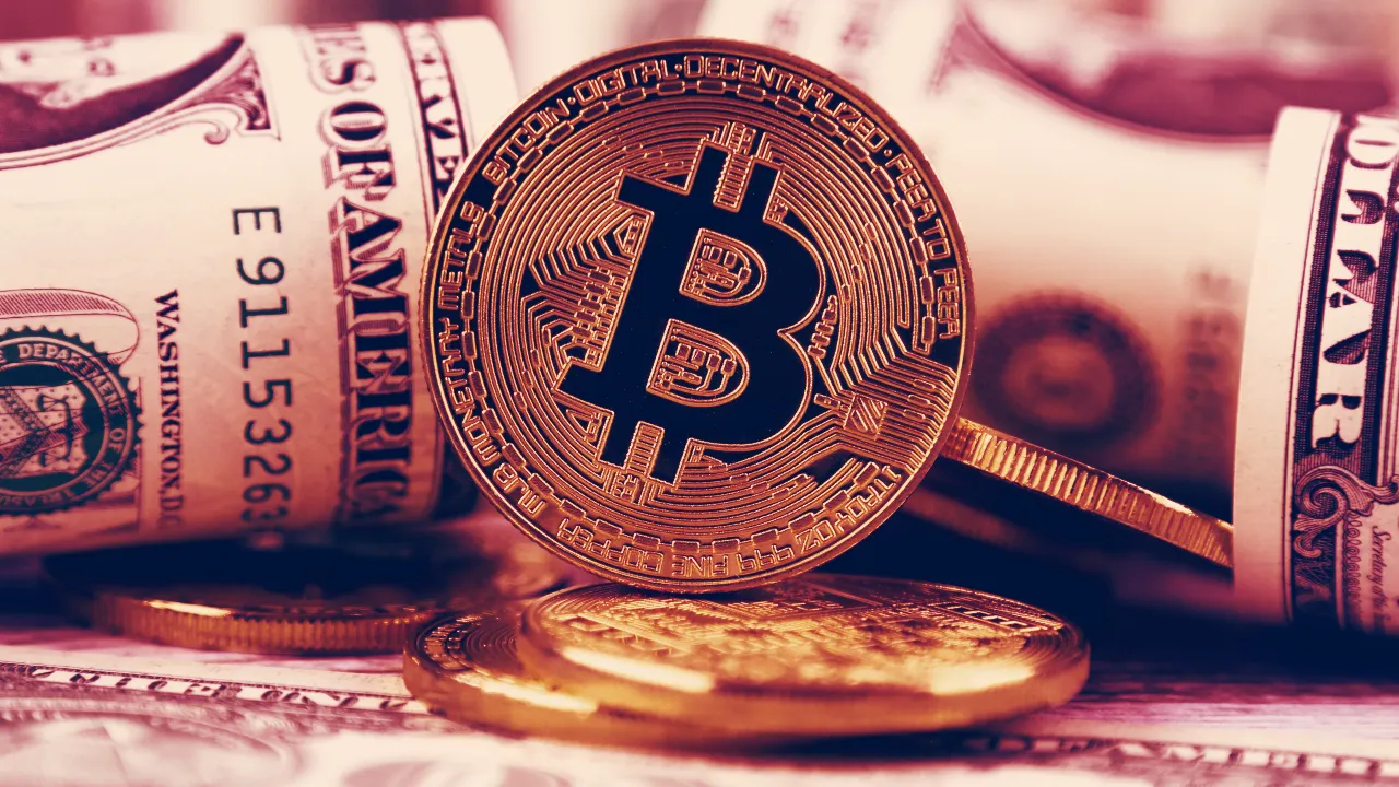 Looking at the price of Bitcoin. Image: Shutterstock