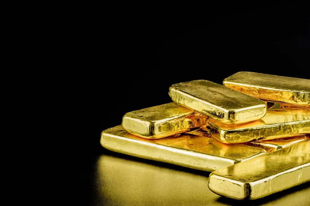 gold bars on a black background