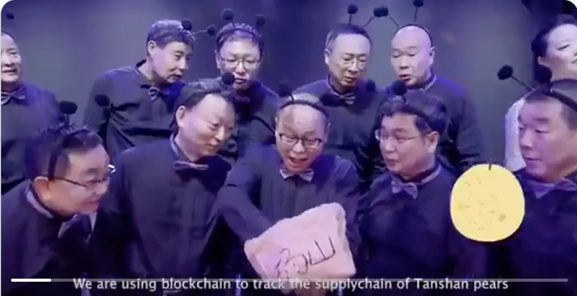 Old men singing in AntChain ad