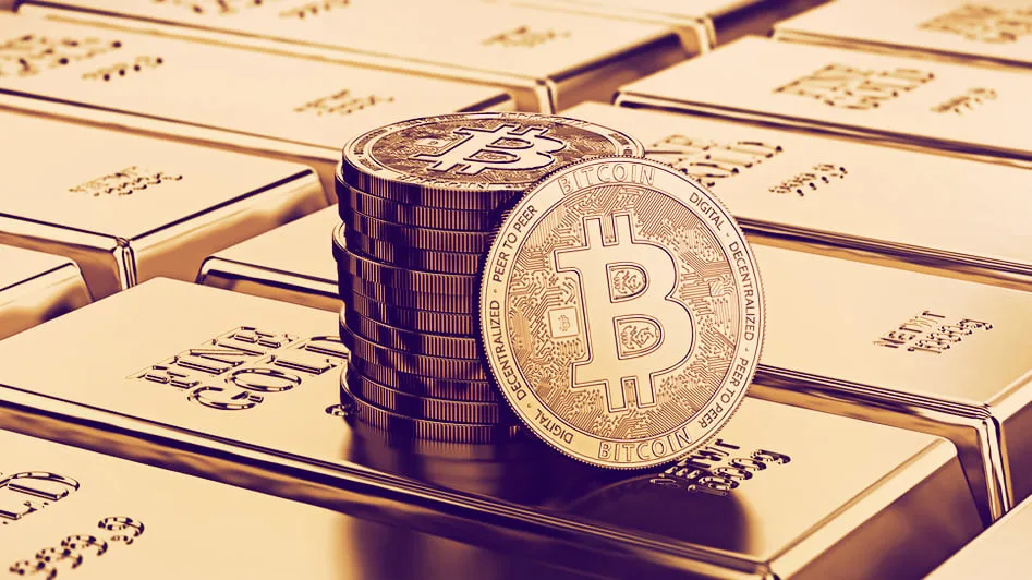 Bitcoin sobre barras de oro. Imagen: Shutterstock