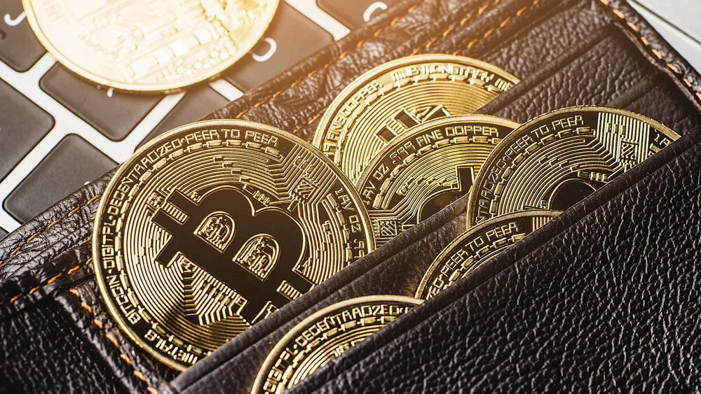 Billetera con Bitcoins. Image: Shutterstock.