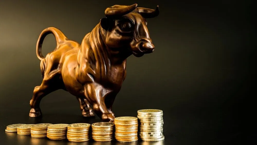 Bull on coins. Image: Shutterstock