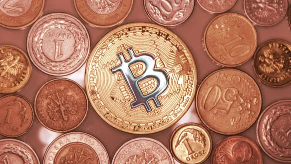 Bitcoin surrounded by some other coins. Image: Shutterstock.