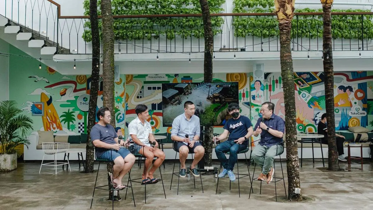 People sitting on high stools