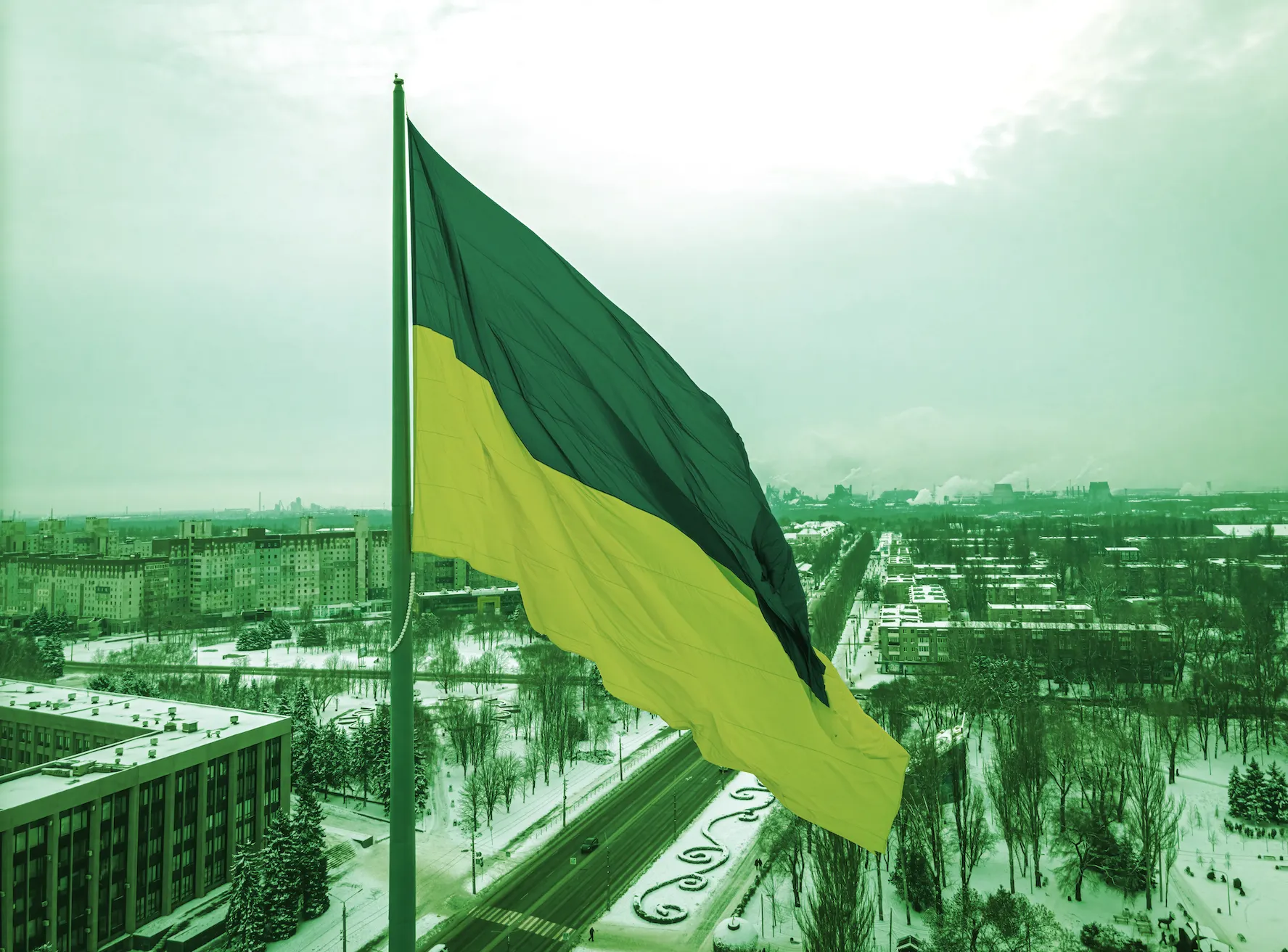 Aerial view of the Ukraine flag in winter. (Shutterstock)