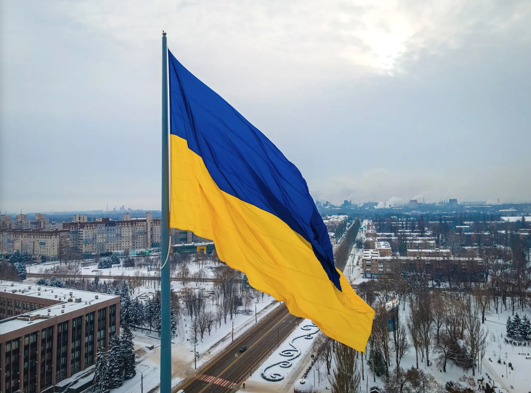 Aerial view of the Ukraine flag in winter. (Shutterstock)