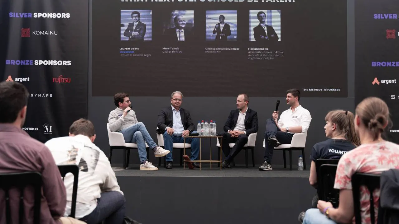 Panel of speakers on a stage