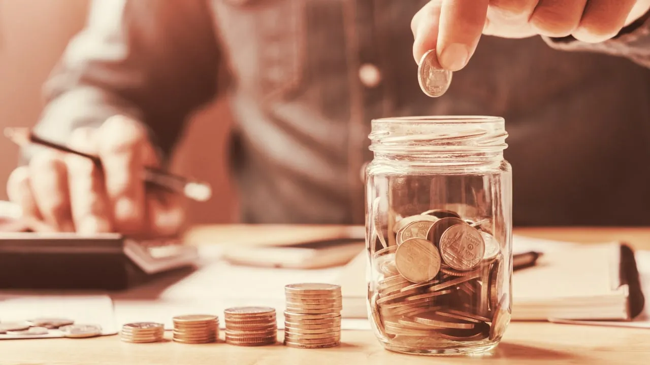 Counting coins. Image: Shutterstock