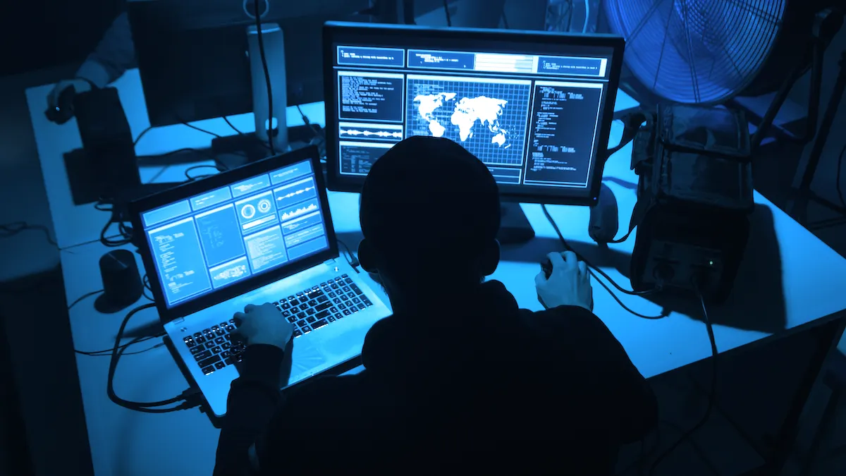 A shadowy hacker at work. Image: Shutterstock