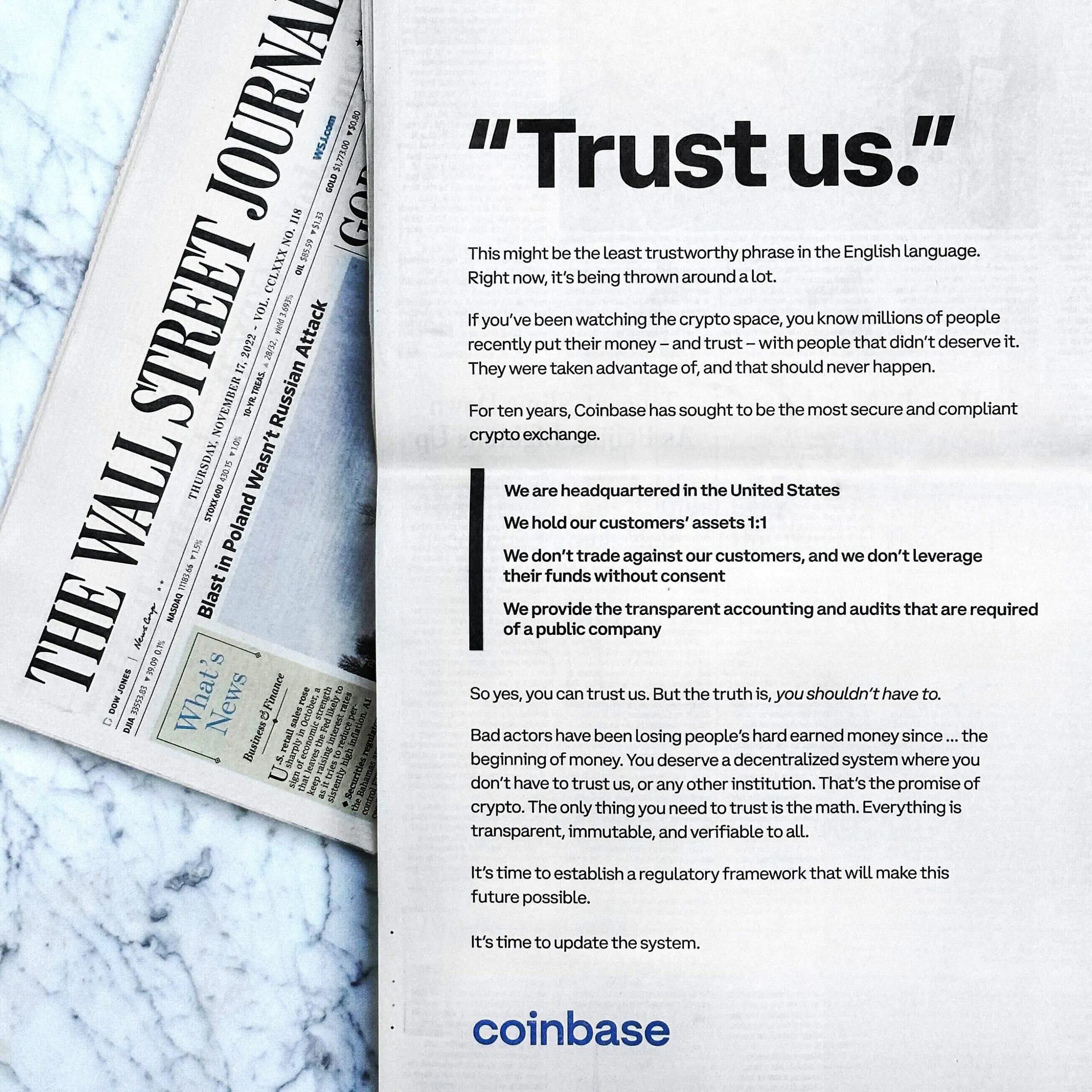 Coinbase "Trust us" ad on copy of Wall Street Journal