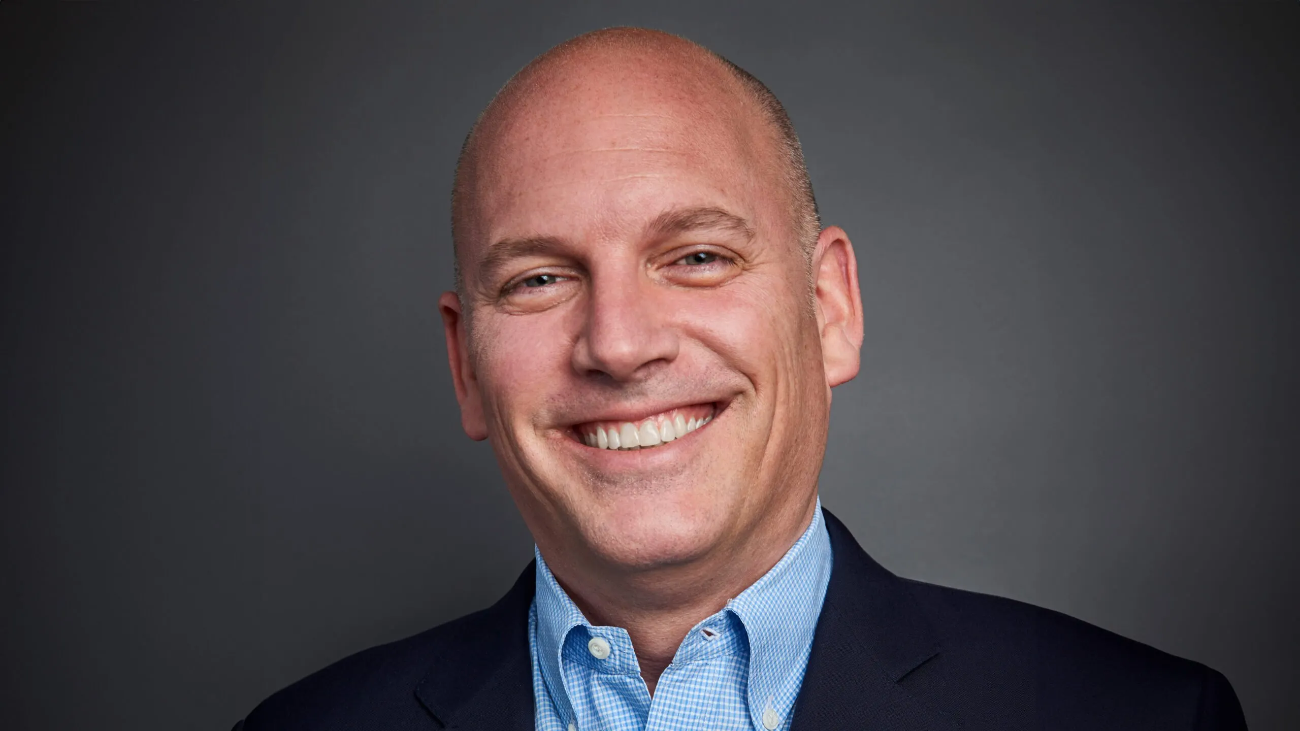 Getty Images CEO Craig Peters. Image: Getty Images, enhanced by AI (extended background).