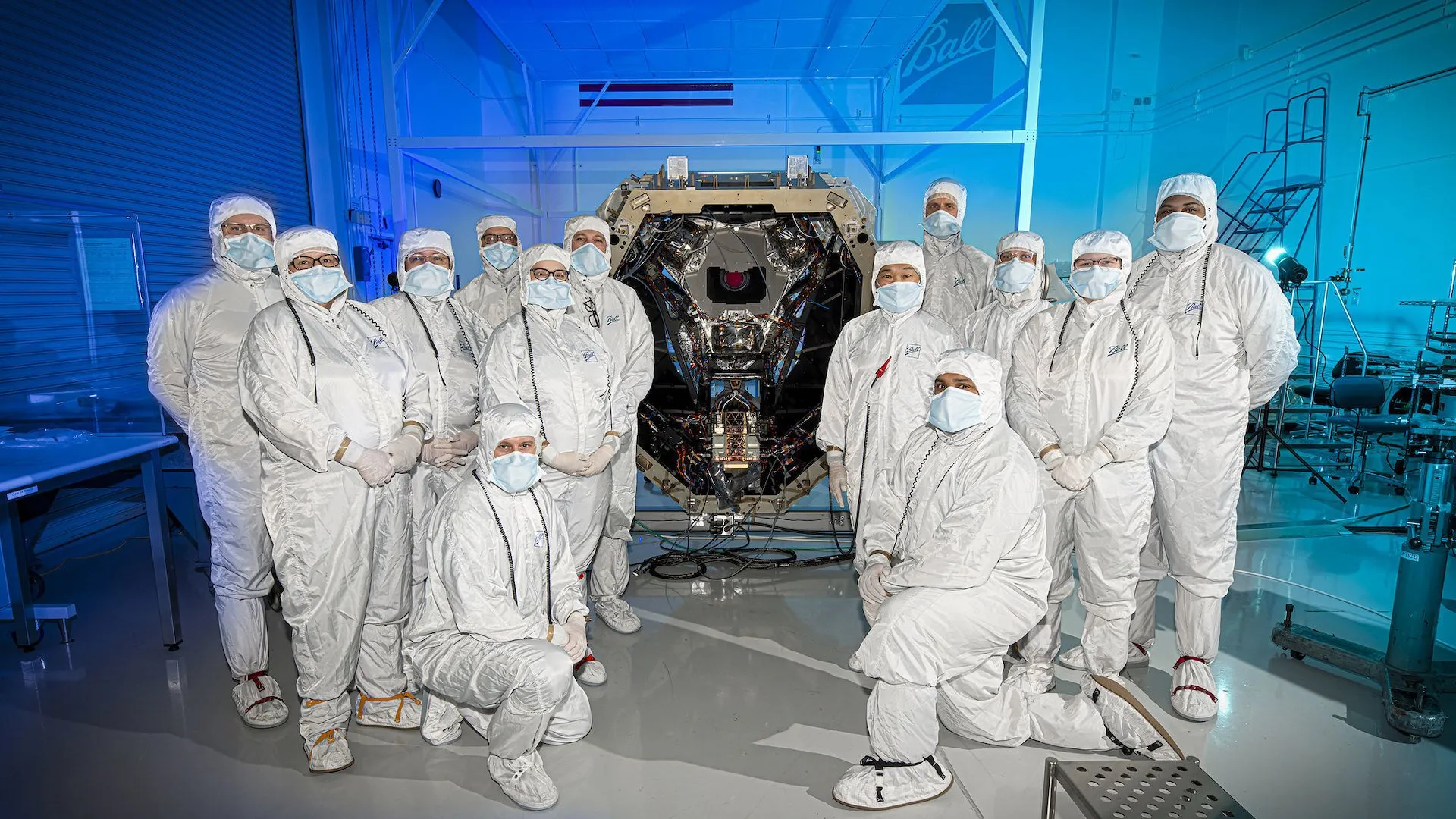 NASA Goddard team members pose with part of the Nancy Grace Roman Telescope. Image: NASA/Flickr