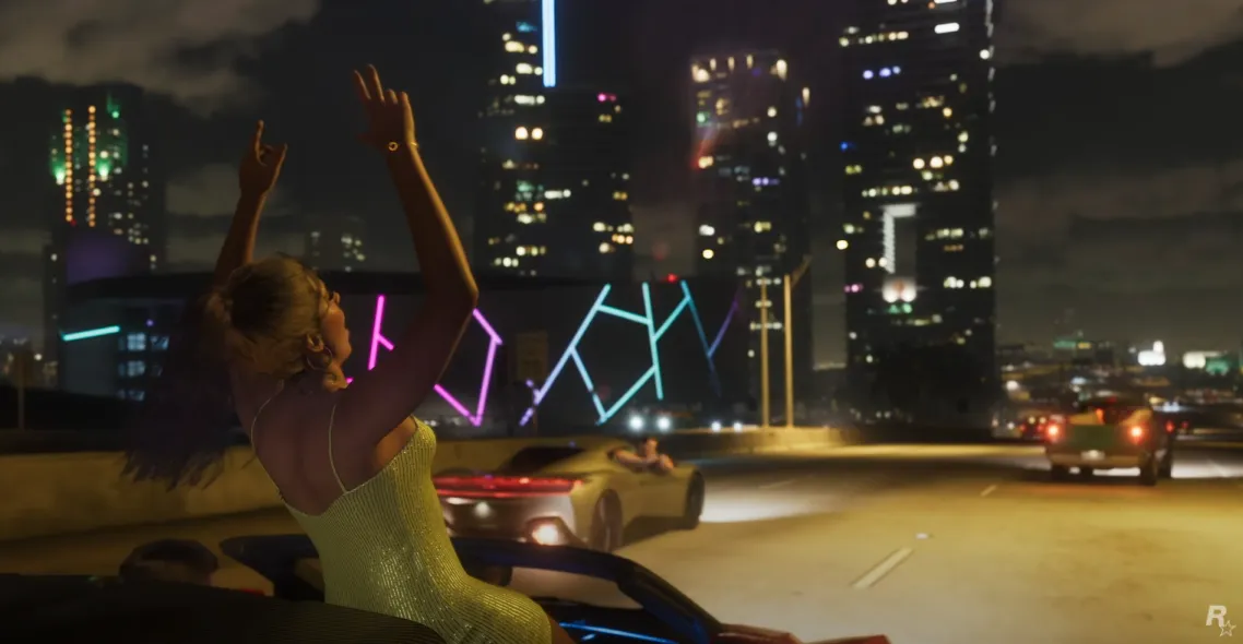 GTA 6 trailer screenshot showing woman standing out of car sunroof while on freeway in Vice City.