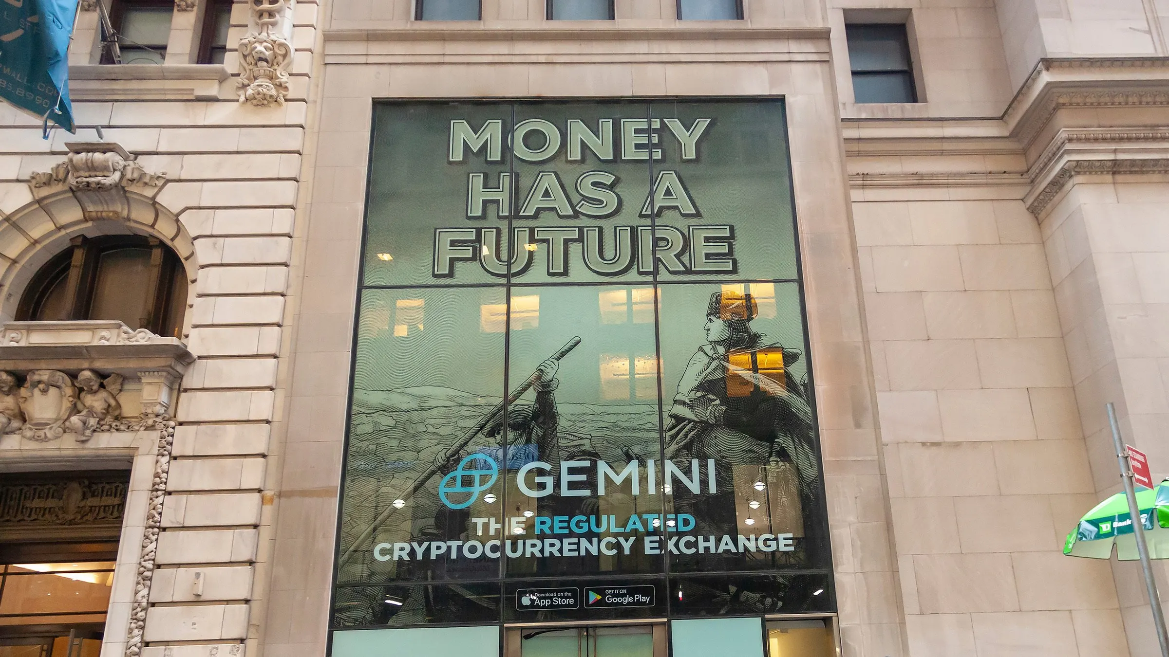 An advertisement for the Winklevoss brothers' Gemini Cryptocurrency Exchange on Wall Street in New York. Image: RBLFMR/Shutterstock