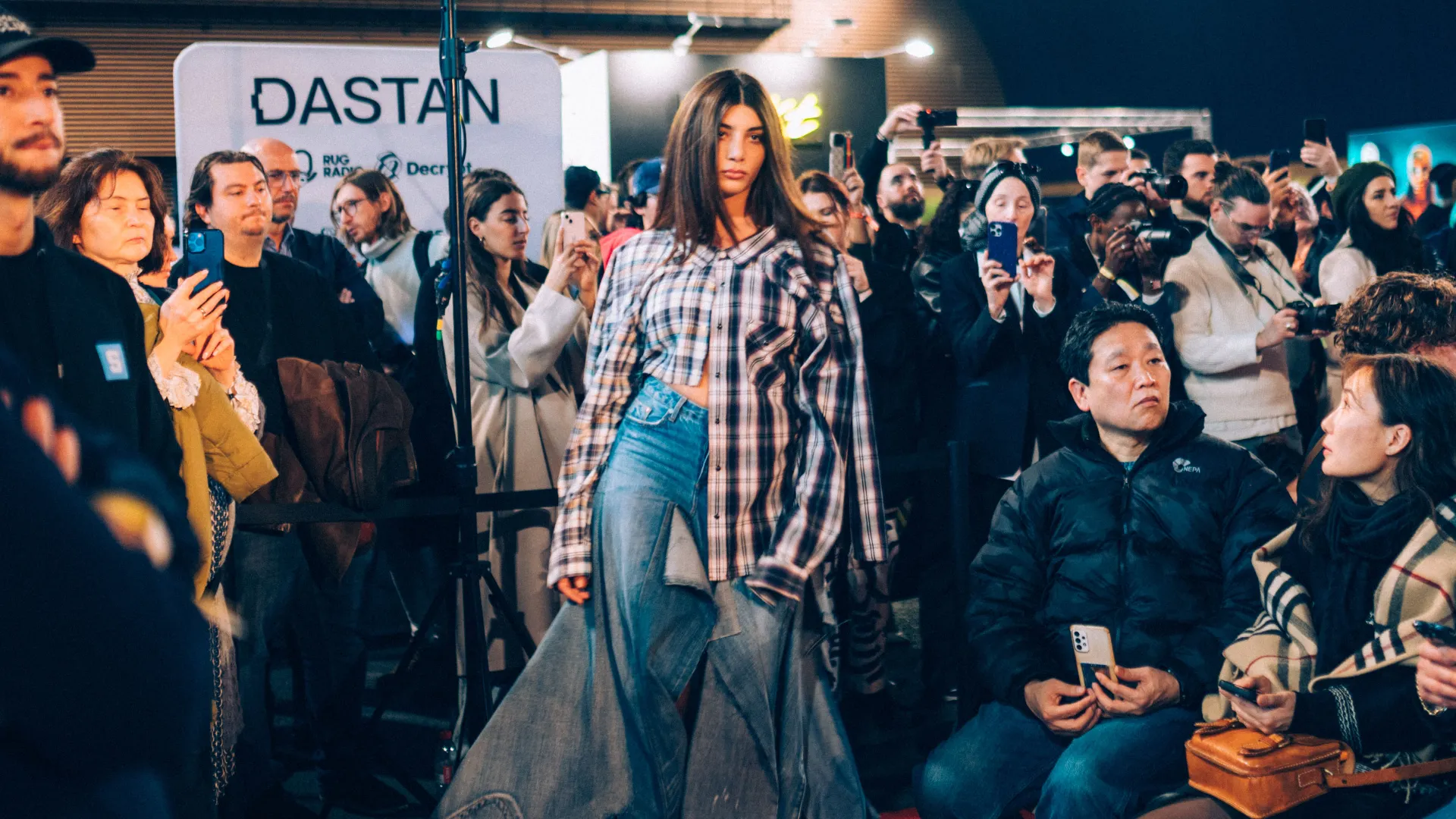 A model strikes a pose at NFT Paris 2024. Photo: Kyle Munson for Decrypt