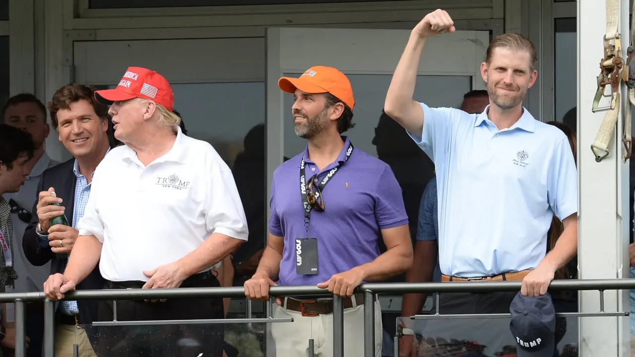 Former President Donald Trump with sons Eric and Donald Jr. Photo: Shutterstock