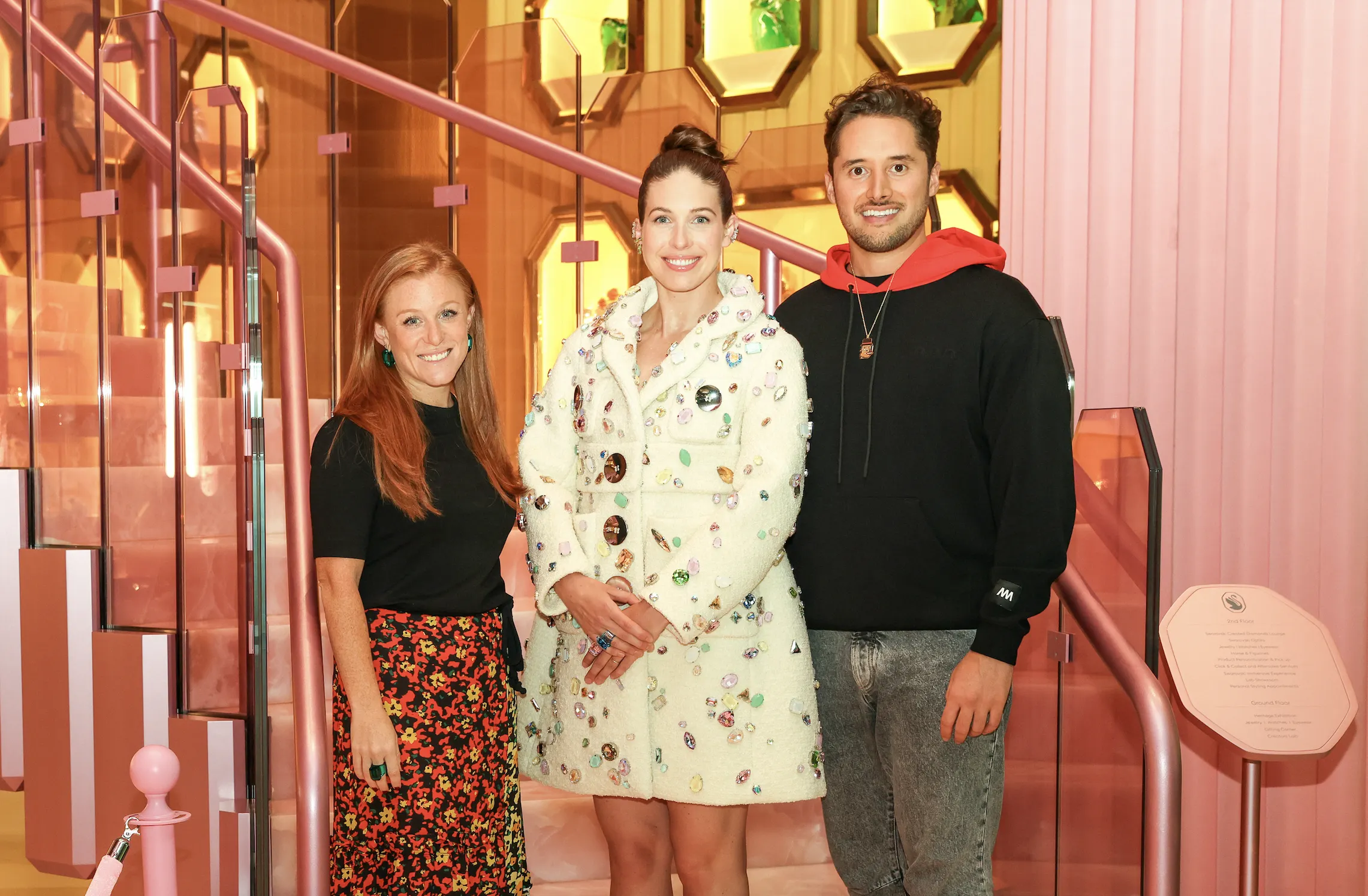 Christie's Nicole Sales Giles, mmERCH's Colby Mugrabi, and Daniel Maegaard, aka Seedphrase (from left), at Swarovski's flagship New York store on Tuesday. Photo: Kevin Czopek/BFA